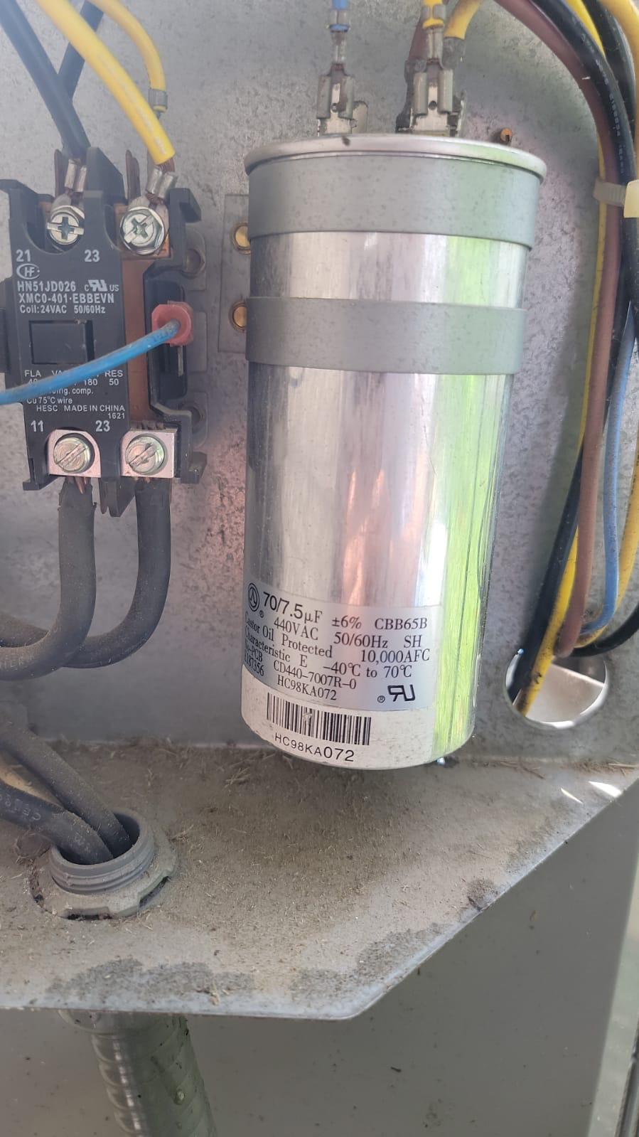 HVAC247PRO licensed Houston HVAC technician on a service call